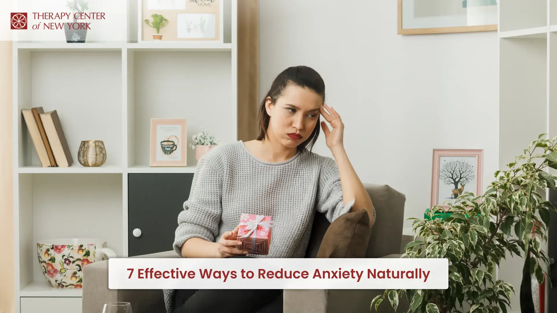 Woman experiencing stress at home illustrating tips to reduce anxiety naturally
